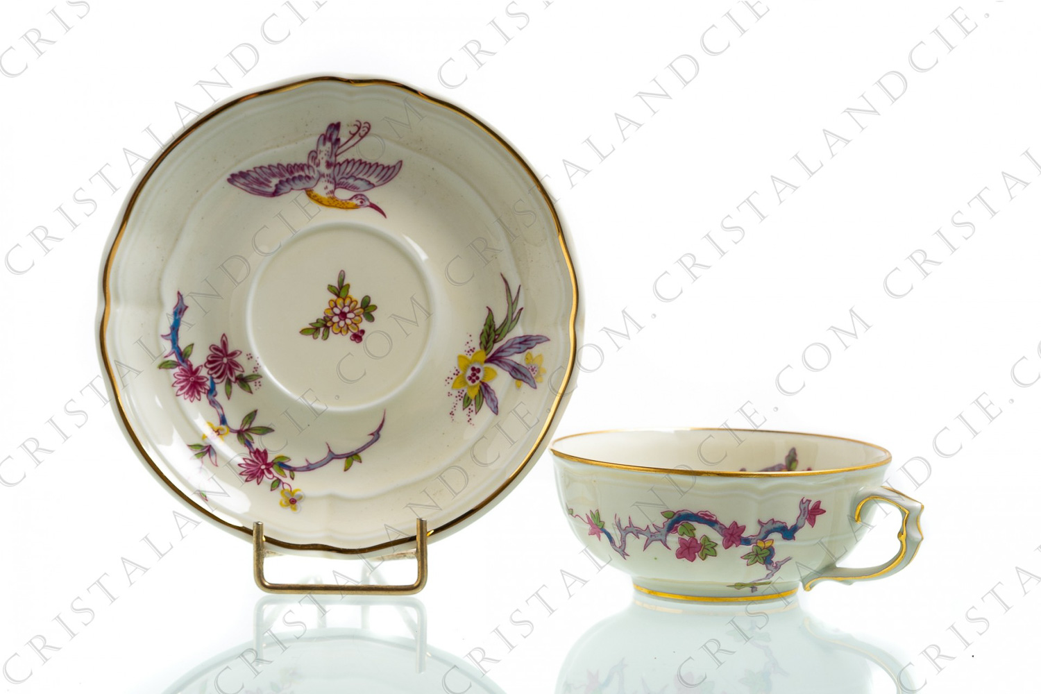 Tea cup in china of Limoges by Bernardaud pattern Chantilly with a Japanese polychrome pattern of flowers and birds of paradise photo-1