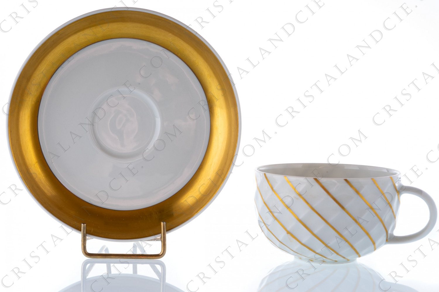 Tea cup in German china by Thomas pattern Holiday in Prague, decorated with a gold enhanced grid on the cup, and a large gold border on the saucer photo-1