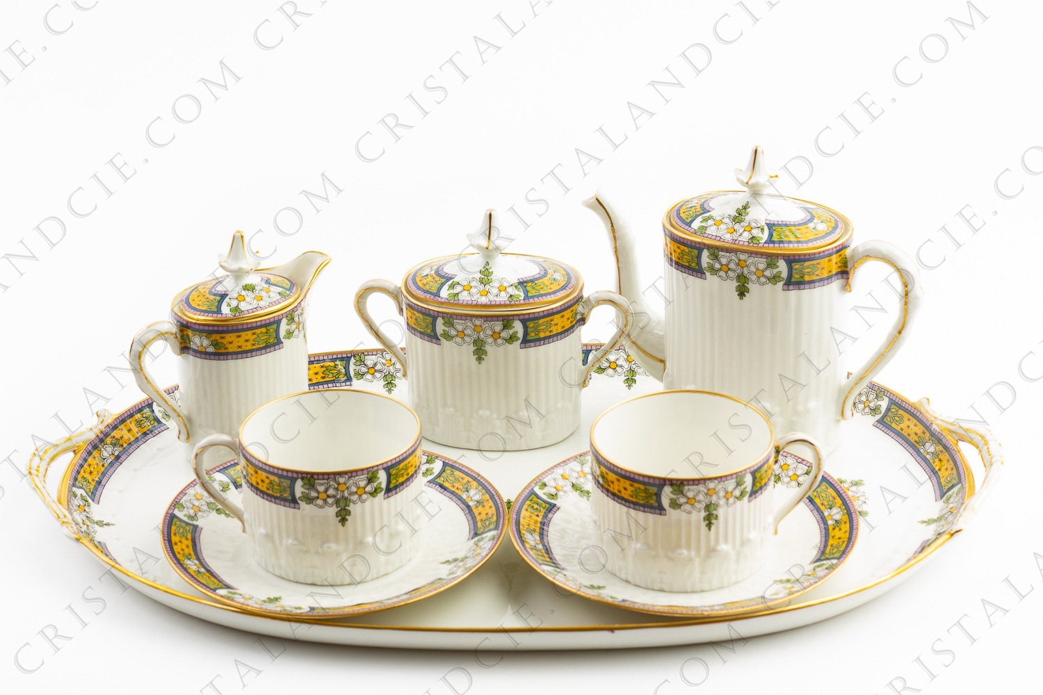 Tête à tête en porcelaine de Limoges de la maison Chabrol et Poirier à décor de frises de fleurs polychromes photo-1
