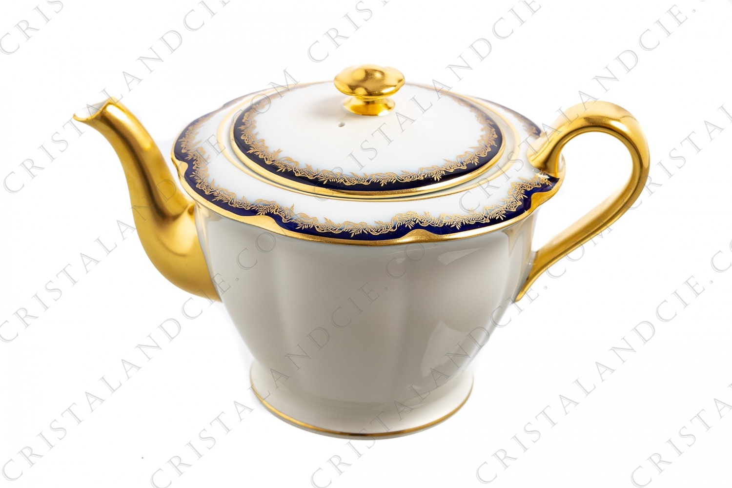 Tea pot in china of Limoges by Theodore Haviland decorated with cobalt blue and gold stripes and with a gold frieze of ribbons and leaves photo-1