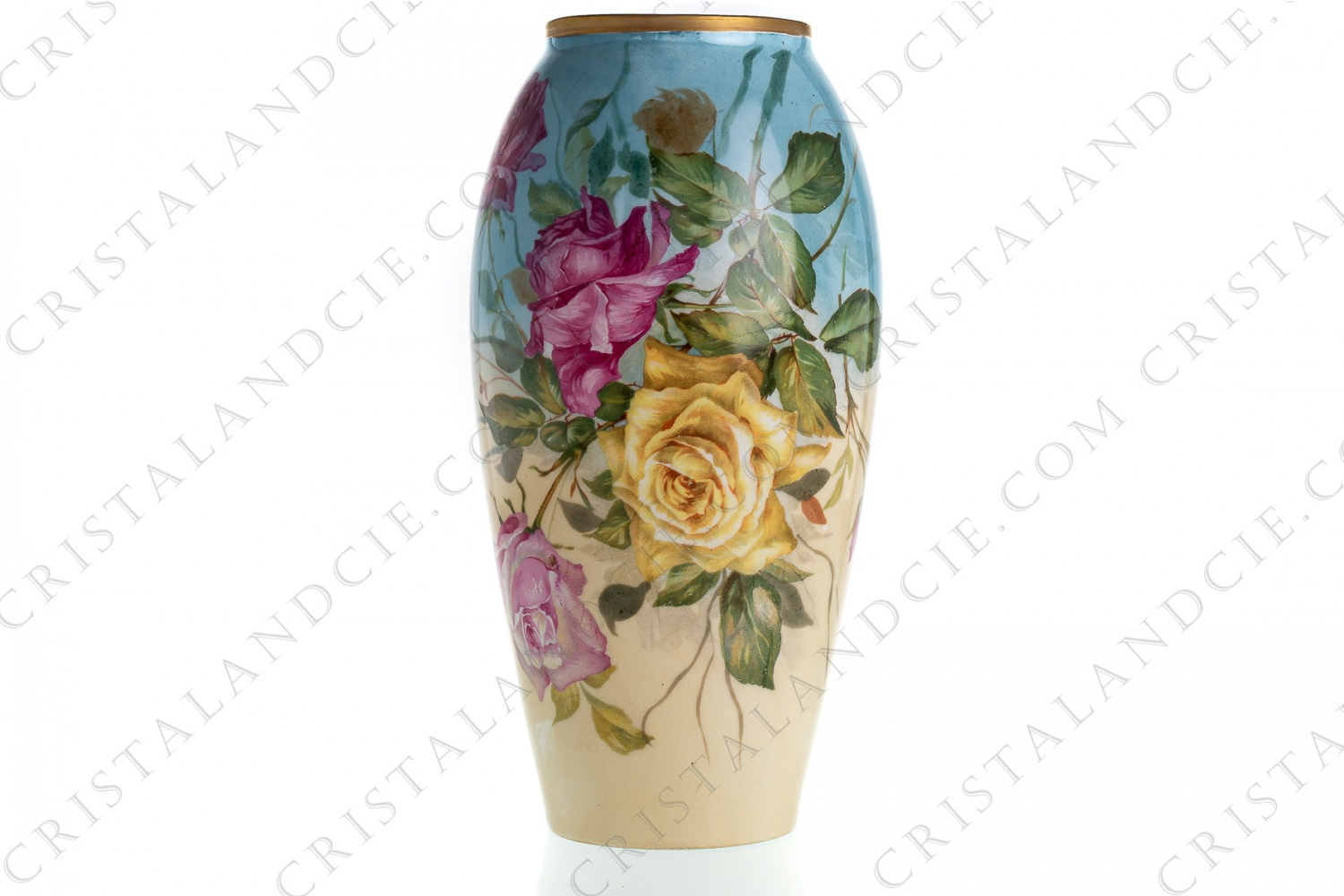 Vase in Limoges china with a hand painted pattern of yellow and pink roses on a blue and beige background photo-1