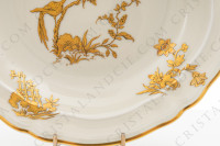 Assiette creuse en porcelaine de Limoges de la maison Bernardaud modèle Reine Elisabeth orné d oiseaux de paradis et de branchages or photo-5