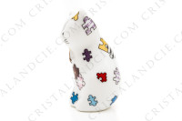 Figurine en porcelaine de Limoges de la maison Bernardaud présentant un chat décoré de pièces de puzzle polychromes photo-2