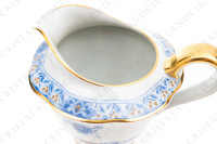 Pot à lait en porcelaine de Limoges de la maison Haviland modèle Arbre bleu forme Lutèce orné d un arbre fleuri pourpre et jaune en son centre, de frises végétales et d un liseré or photo-2