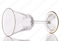 Verre à vin rouge n°3 en cristal de Saint-Louis modèle Apollo or présentant un important décor taillé et des filets or photo-2